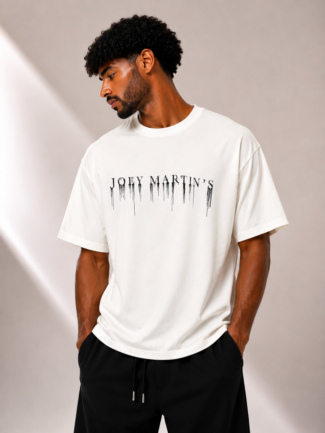 טי שירט - JOEY MARTIN’S - לבן כיתוב שחור
