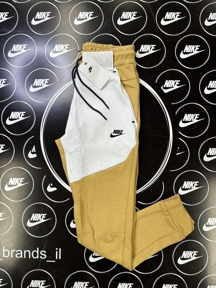 מכנס ארוך בז‘ לבן 2023 - TECH FLEECE - יוניסקס