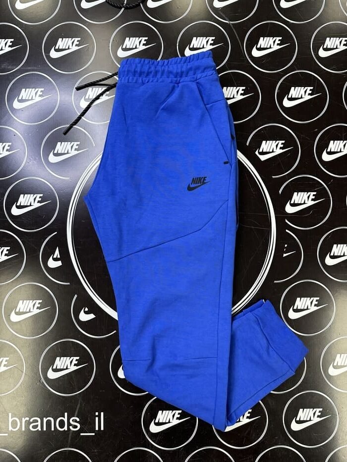 מכנס ארוך כחול רויאל 2023 - TECH FLEECE - יוניסקס