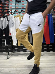 מכנס ארוך בז‘ לבן 2023 - TECH FLEECE - יוניסקס