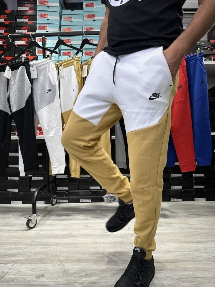 מכנס ארוך בז‘ לבן 2023 - TECH FLEECE - יוניסקס