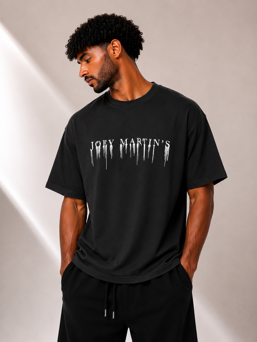 טי שירט - JOEY MARTIN’S - שחור כיתוב לבן
